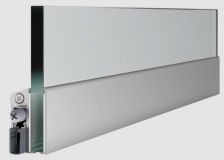 Padací práh Schall-Ex GS-A pro skleněné dveře 1083mm, bez nalepené lep.pásky, jednostranné spouštění, silikon, stříbrný elox